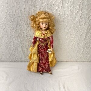 Elegant Red and Gold Porcelain Doll Brass Key Victorian Garden Porcelain Doll